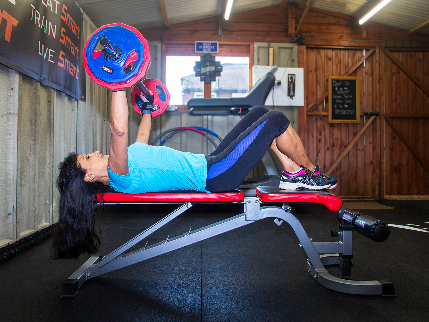 Rose Pantoja bench pressing weights